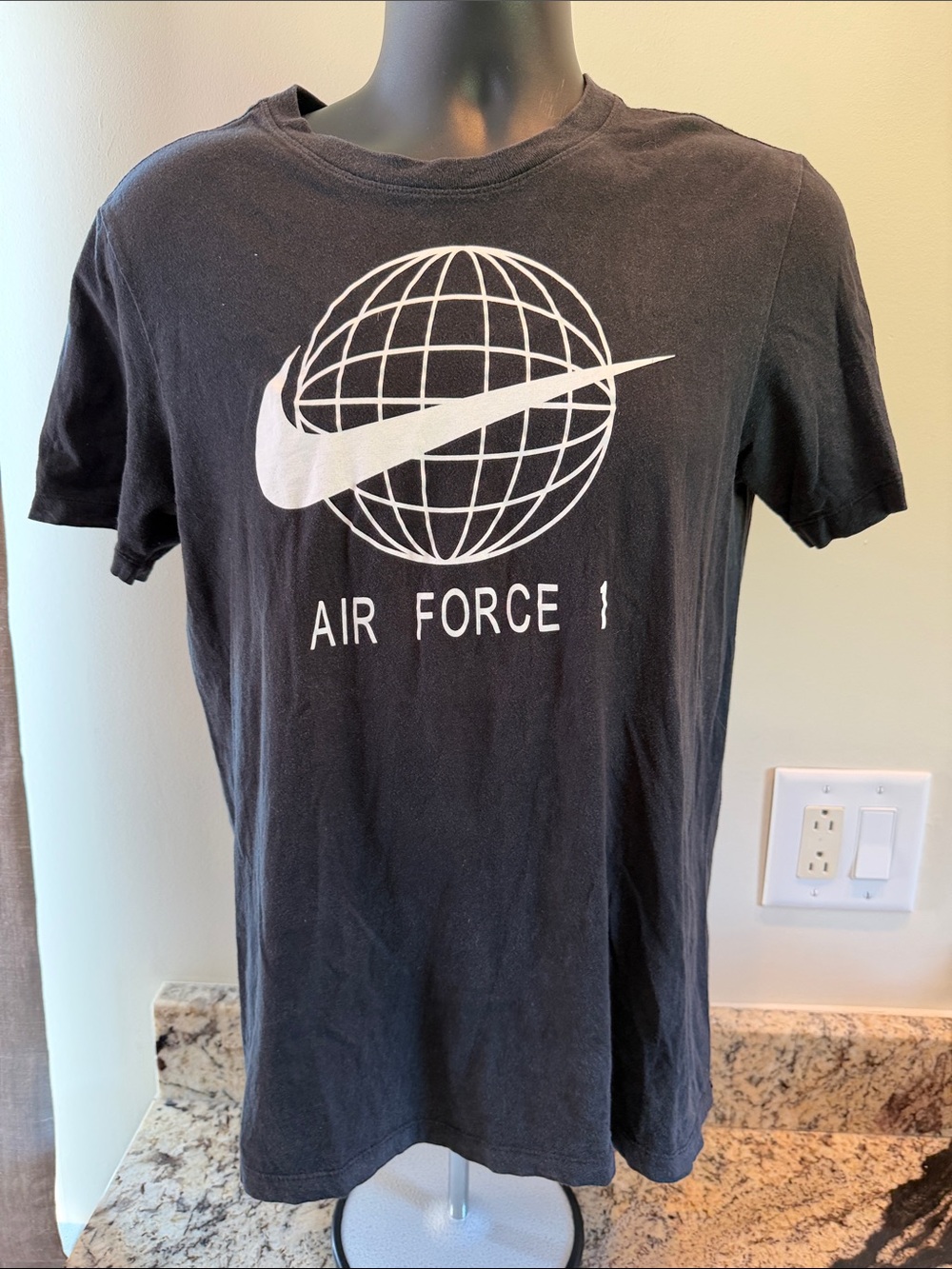 Nike Black Short Sleeve Tee with White Globe Swoosh Graphic